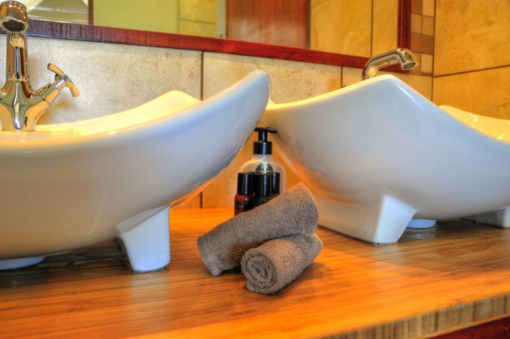 Cheetah Paw Eco Lodge Guernsey Nature Reserve Quarto foto