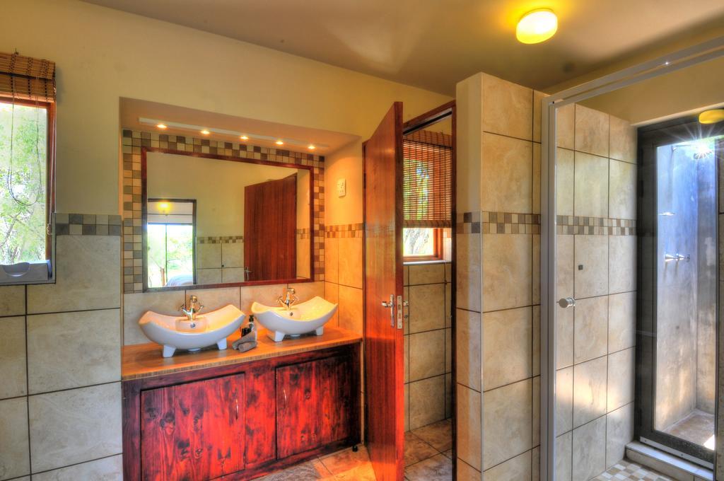 Cheetah Paw Eco Lodge Guernsey Nature Reserve Quarto foto